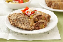 Beef roulade with buck wheat pancakes and pepper salad