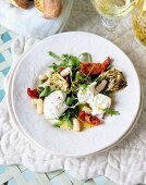 Artichoke salad with mozzarella and wild rocket