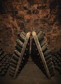 Dusty bottles in wine cellar