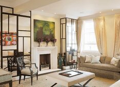 Elegant living room with mirrored elements on both sides of fireplace