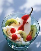 Fruit salad with pears, kiwis and raspberries
