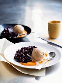 Coconut ice cream with black sticky rice and squash sauce