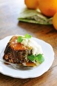 Baked blood orange pudding turned out on plate