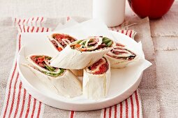 Stuffed, flat bread 'rollers'