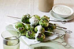 Grilled Brussels sprouts kebabs with blue cheese dip