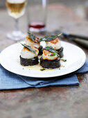 Scallops with sage on black pudding