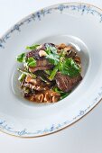 Beef with peanuts and coriander