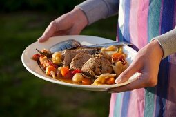 Plate with beef soup