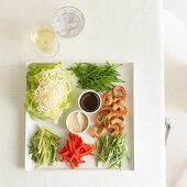 Grilled king prawns with salad ingredients