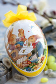 An Easter egg with a picture of rabbits