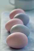 A row of pastel-coloured Easter eggs