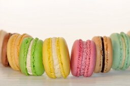 A row of different coloured macaroons