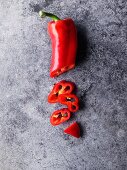 A red chilli pepper, sliced
