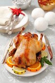 Roast duck with oranges for Christmas dinner