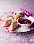 Dumplings with a spicy sauce