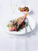 Red mullet on green beans and tomatoes