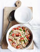 Buckwheat spaghetti with cherry tomatoes and parsley