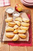 Quark turnovers with apple filling and confectioner's sugar