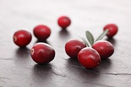 Cranberries on a slate surface