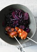 Caramelised chicken kebabs with red cabbage
