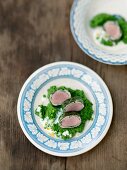 Lamb roulade with mushy peas