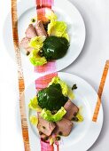Chive aspic on slices of marinated roast veal