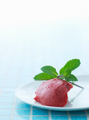 Raspberry ice cream with fresh mint