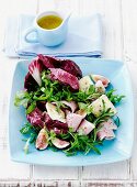 Mixed leaf salad with ham, soft cheese, figs and a honey and mustard dressing