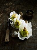 White cabbage leaves filled with fish