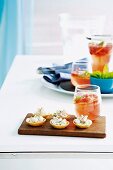 Prawn and dill tartlets and a fizzy strawberry drink