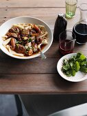 Homemade egg pasta with beef in broth