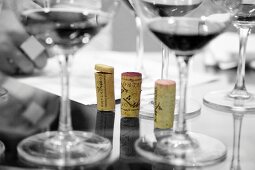 Corks and glasses of wine at a tasting session