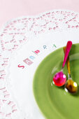 A doily with stickers as a place card