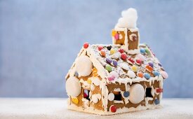 A gingerbread house decorated with sweets