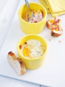 Oeufs cocotte with chorizo and white bread
