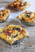 Sweet potato and carrot tartlets with red onions