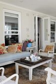 Roofed veranda with country-style furnishings