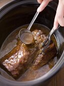 Pork and gravy in a slow cooker