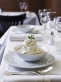 Cream of chestnut soup with bacon and whipped cream (velouté)
