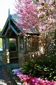 Pavilion and flowering trees in garden