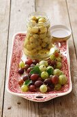 Gooseberry compote and fresh gooseberries