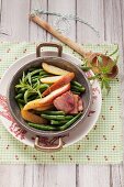 Green beans with bacon, pears and potatoes