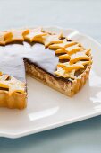 Cheesecake with chocolate glaze and star fruits