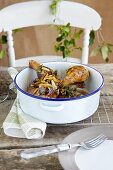 Braised chicken with plums, almonds and rosemary and a honey and orange glaze