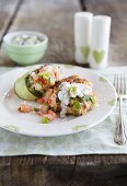 Salmon cakes with a warm cucumber salad