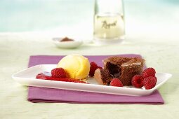 Chocolate cake with raspberries and sorbet