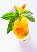 A basil and orange mojito