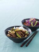 Beef teriyaki with spring onions, cashew nuts and rice