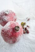 Pomegranates decorated with artificial snow