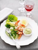 Prawns with avocado cream and a salad garnish